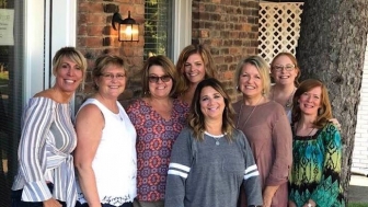 Michelle McCauley (far left) with her team outside of The Haven, an abortion recovery ministry located right next to Toledo&#039;s last abortion facility.