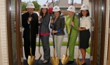Archbishop Gregory Aymond, Dr. Susan Caldwell, Gayle Benson, Phyllis Taylor, Angie Thomas (left to right) break ground on the new location a parking lot away from Planned Parenthood
