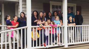 A group from a local church on the porch at Newton PRC just before the grand opening