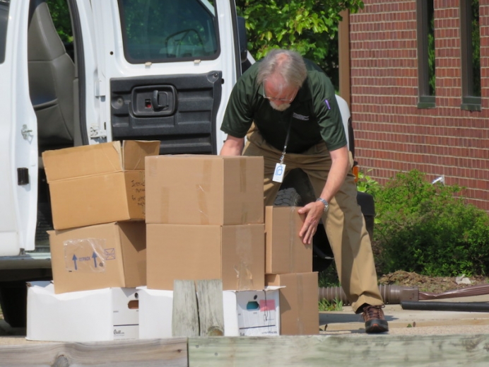 Planned Parenthood of the Heartland&#039;s Brant Morgan collects boxes of personal health information May 16 that Planned Parenthood knowingly left unattended for 10 days.