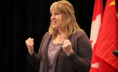 Betty McDowell speaks at a pregnancy help event