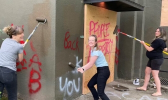 Volunteers from Hinson Memorial Baptist Church helped clean up after a pro-abortion attack on First Image Pregnancy Resource Centers