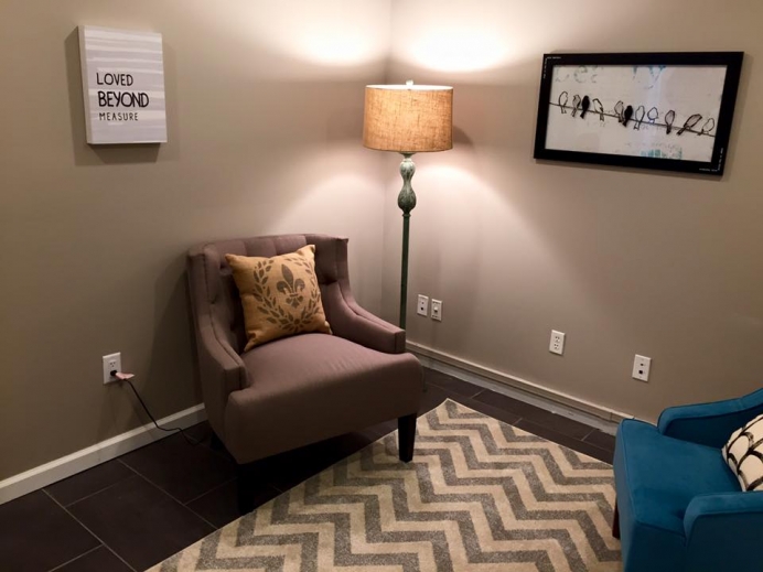 The sign in the counseling room at Pregnancy Care Center: &quot;Love Beyond Measure.&quot;