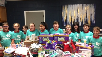 Fifth graders at at St. John Catholic School in Russellville, Arkansas make the most out of a few hundred dollars by helping a local pregnancy help center.