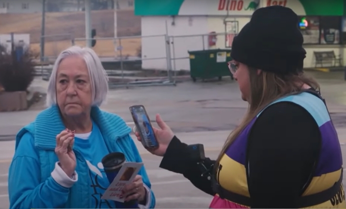 Abortion escort Shelley Mann gets right up in the face of a pro-life advocate with her phone