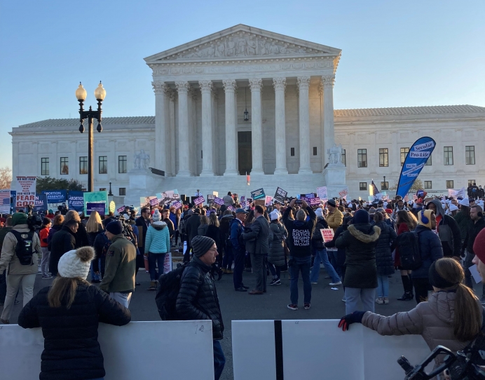 Crowds gathered outside the Supreme Court for oral arguments in the Dobbs v. Jackson Women’s Health case